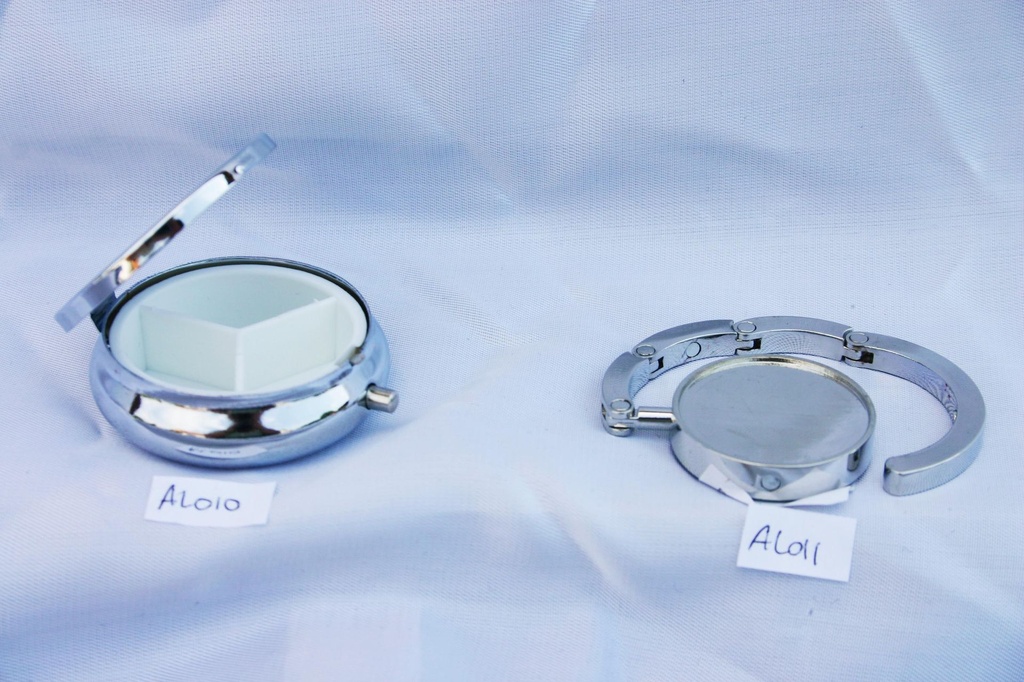 PORTABORSE METALLO DA PERS. C/STICKER 