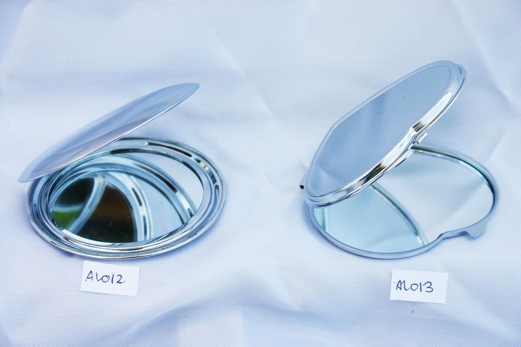 SPECCHIO METALLO ROTONDO DA PERS. C/STICKER 