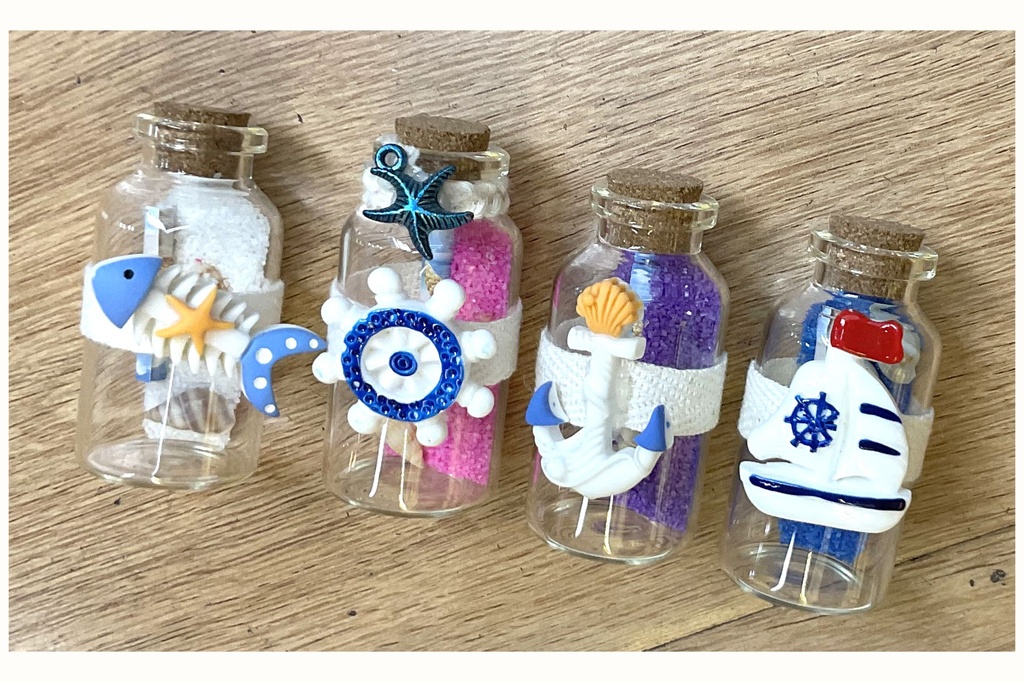 BOTTIGLIETTE VETRO C/INSERTO RESINA E SABBIA 5.5*2 