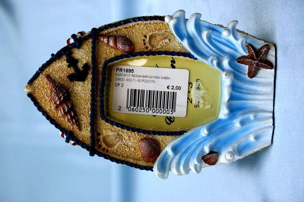 PORTAFOTO RESINA BARCA/CASA SABBIA 2 MOD.ASS 