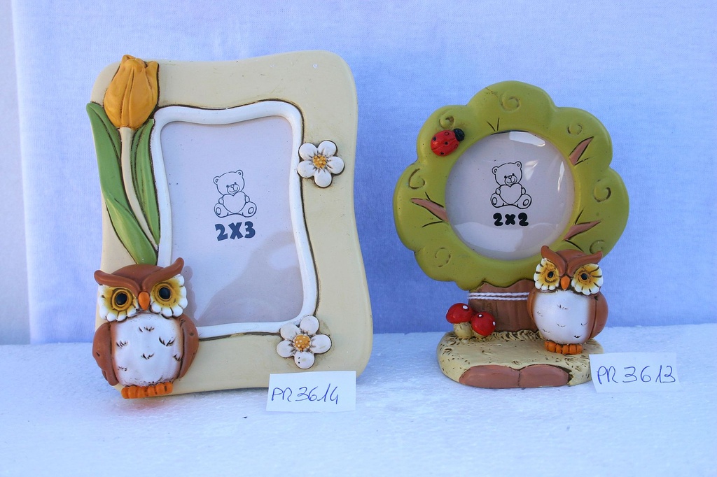 PORTAFOTO C/GUFO RESINA 