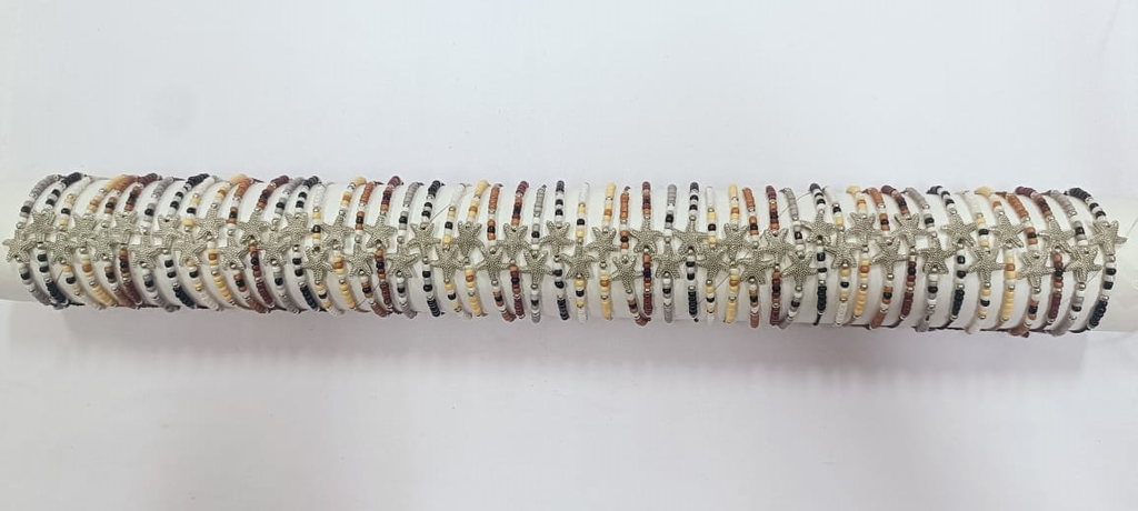 BRACCIALE PERLINE E METALLO SU TUBO